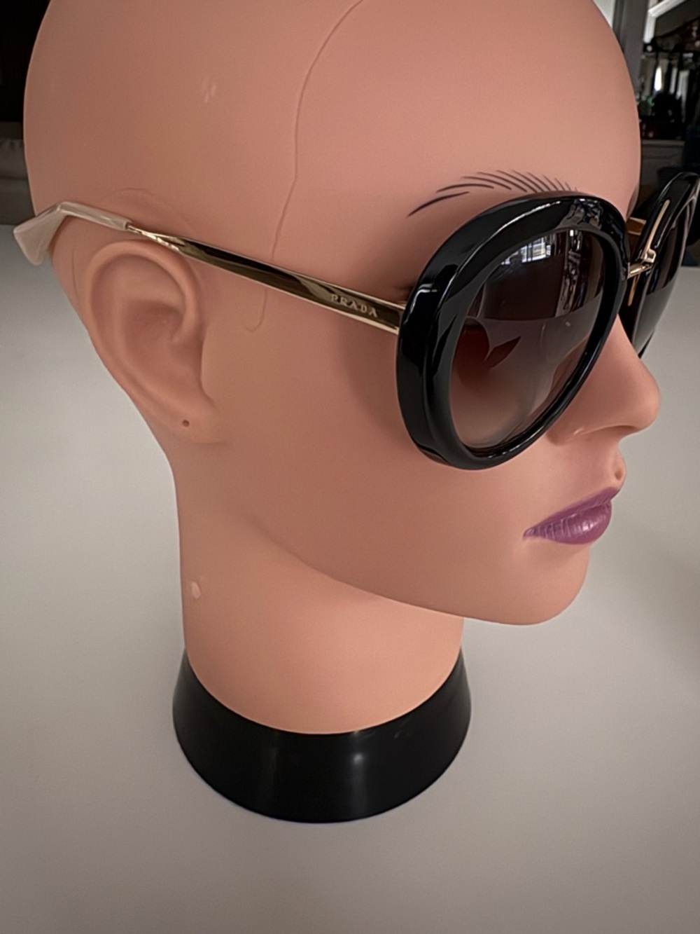Prada Black Round Frame Sunglasses with Gold Temples